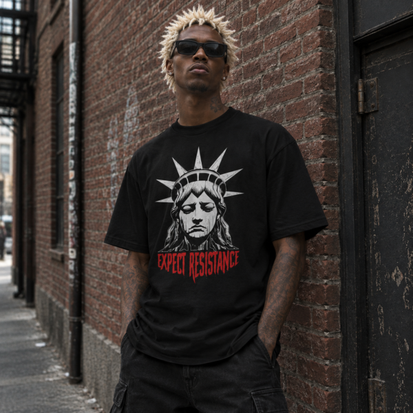 Model wearing a black and red New York Resistance graphic tee, front view