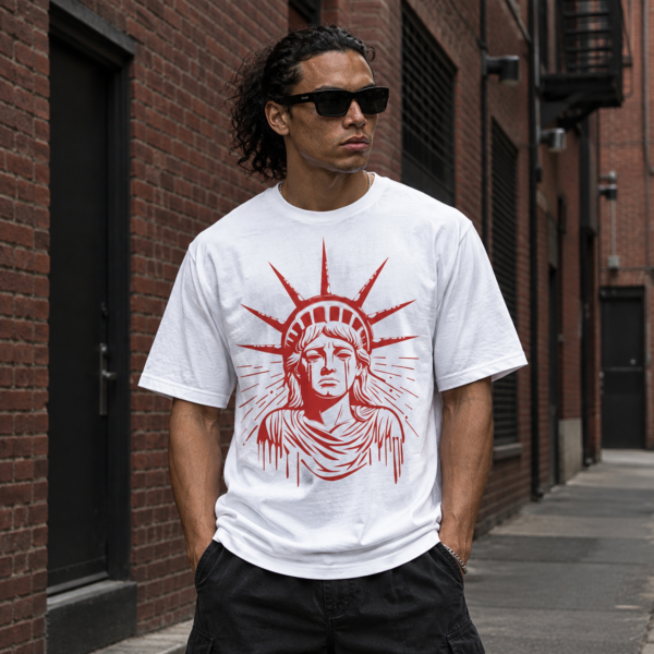 Model wearing a white t shirt with red Crying Liberty, front view