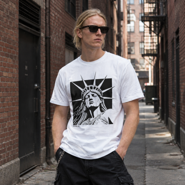 Model wearing white protest graphic tee, NY, Liberty statue, front view
