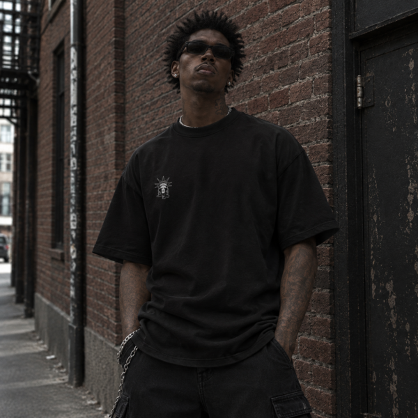 Model wearing black liberty graphic tee, front view