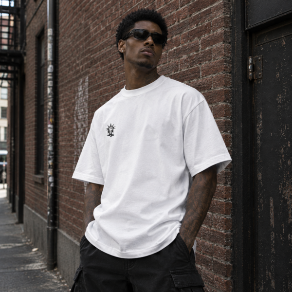 Model wearing white minimal graphic tee, front view